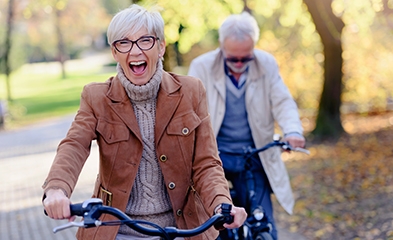Older couple riding bicycles