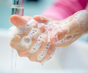 Child washing hands