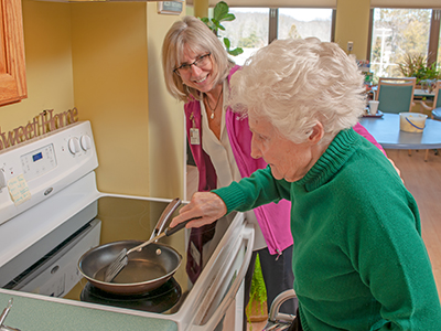 Occupational therapist cooking with a patient